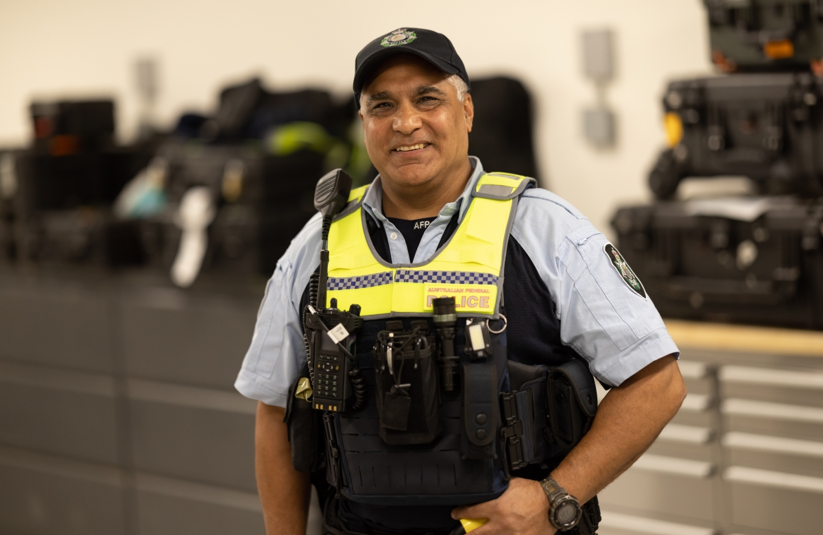 Protective Service Officer standing inside an AFP equipment facility
