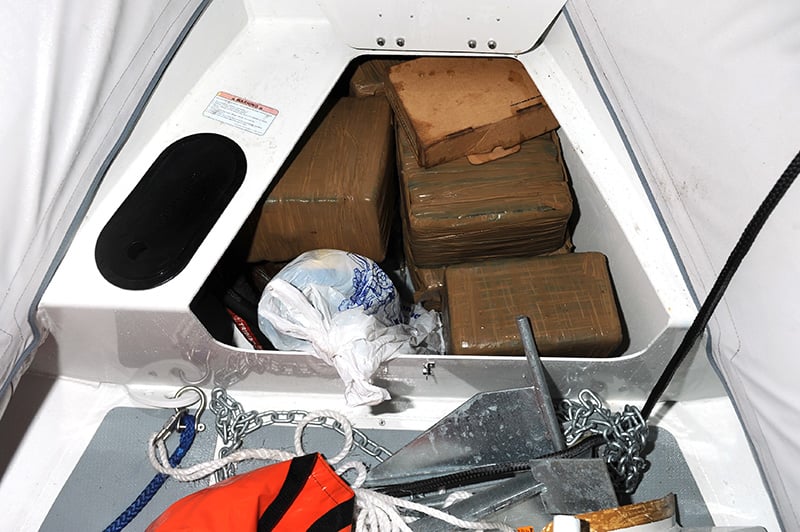 Packages of drugs hidden in a compartment on a boat