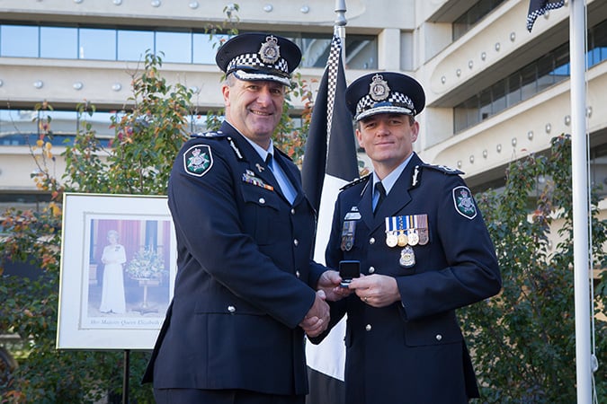Commander Grant Edwards with the AFP Commissioner Andrew Colvin