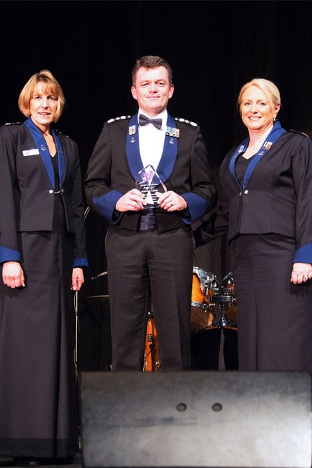 Commissioner Andrew Colvin with Managing Learning and Development Kylie Flower (left) and Assistant Commissioner Debbie Platz after receiving his Special Contribution Award.