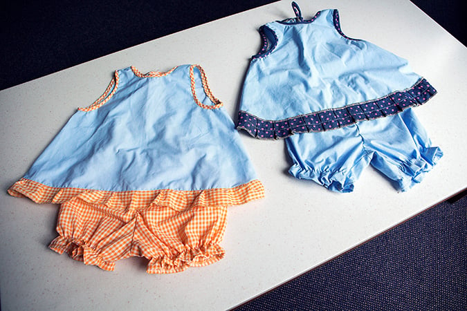 Two sets of kids clothing made from old AFP uniforms