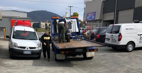 The seized bike loaded onto a tow truck