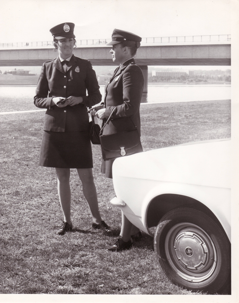 All ACT policewomen were issued with new uniforms by 1972. Worn here by Sue Beatty (Dawson) and Louise Lammin (Baer) at Lake Burley Griffin in Canberra. AFPM1679.