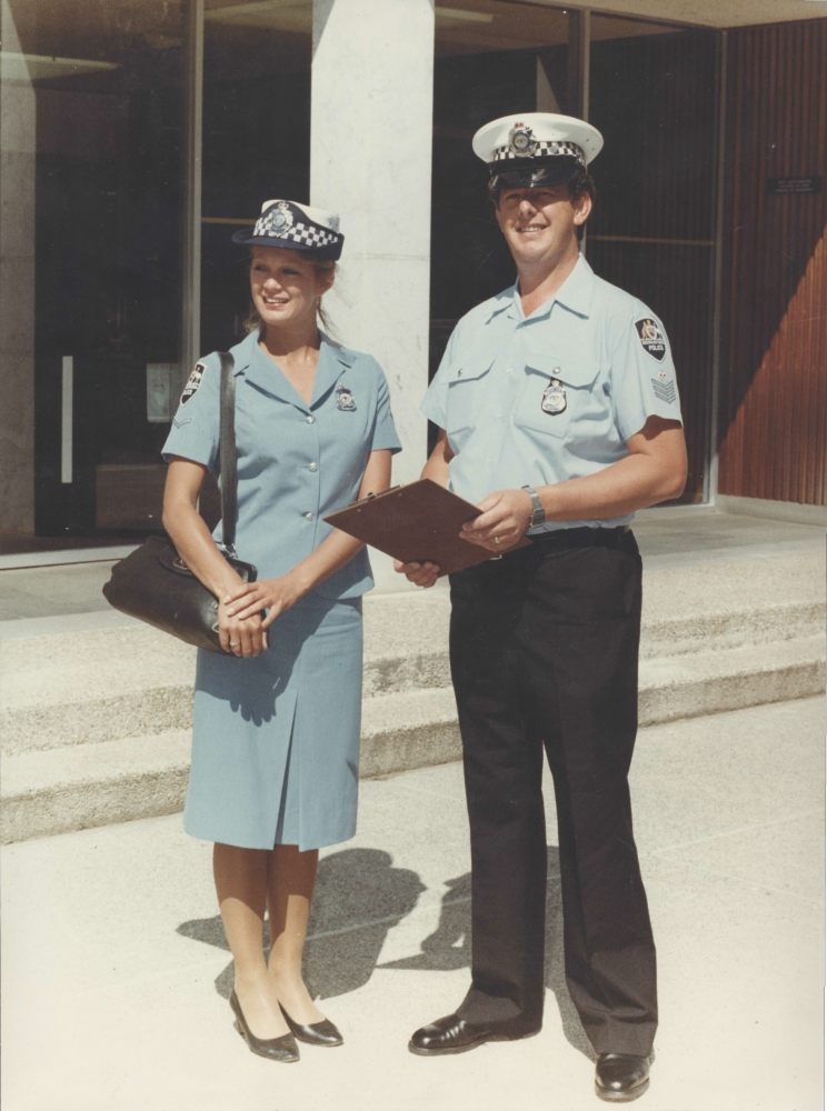 The ACT Policing and AFP summer policewomen’s uniform and the ‘infamous’ handbag. Worn here by Gail Calderwood with Peter Lindsay AFPM422