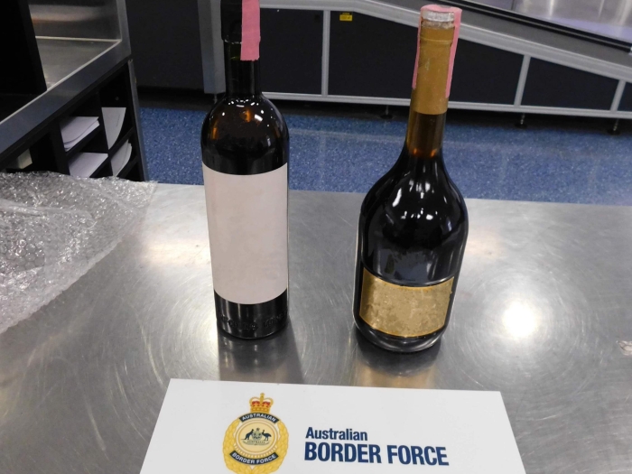 A Taiwanese national has been charged for allegedly importing more than 20kg of methamphetamine concealed in wine bottles 