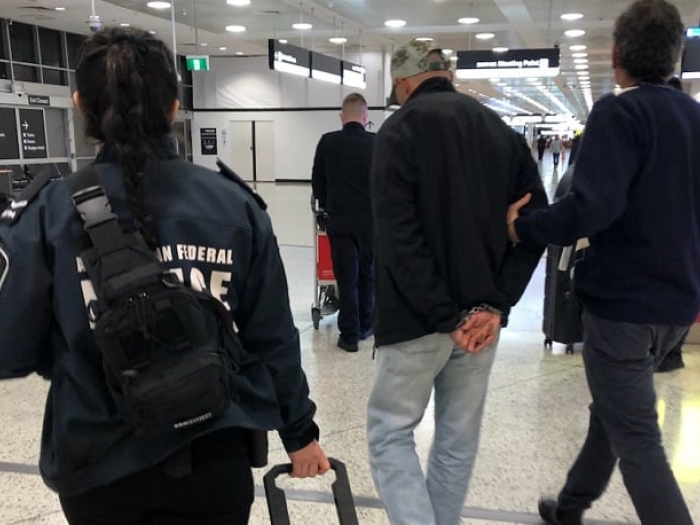 AFP arrest man at airport