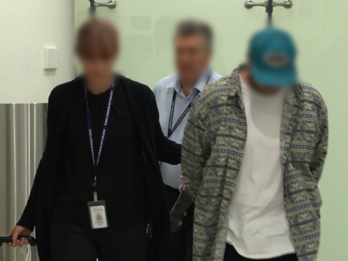 A man is arrested by ABF investigators at Perth Airport