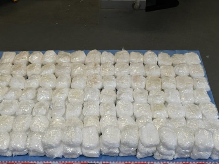 Multiple rows of methamphetamine wrapped in clear plastic
