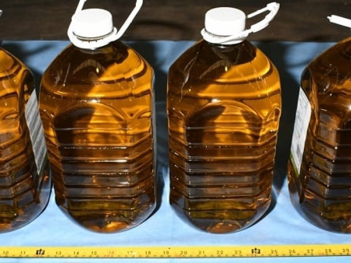 Image of seized methed in oil bottles