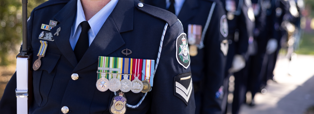 AFP member in ceremonial uniform with six medals on their chest