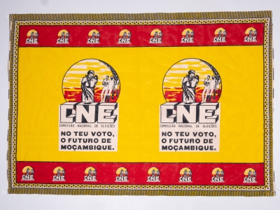 This fabric election banner is reminding residents about the importance of voting for the future of Mozambique.  The Portuguese text on the banner translates to 'National Commission of Elections in your vote and future of Mozambique' (AFPM2103)