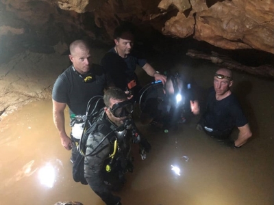 AFP divers in the murky waters of the cave system, Thailand