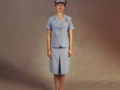 The ‘impractical’ summer uniform - a tunic and skirt. Polyester - machine washable, light iron. Worn by Constable Charmaine Quade in 1987 (AFPMRN9302)