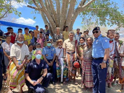AFP officer with Timor-Leste community members