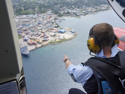 AFP police officer in helicopter over Solomon Islands 
